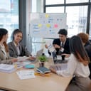 Group of young Asian businesspeople seminar to discuss planning strategies development of presentations from each department to plan new business in the company to expand.