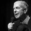 Black and white photo of elderly Leonard Cohen performing