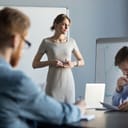 Stressed business woman leader executive in tension feels worried thinking
