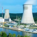 Exterior view of a nuclear powerplant with two cooling towers visible