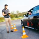 Woman taking a driving lesson