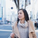 Young woman walking in the city