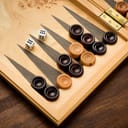 close-up of a Backgammon board with two dice