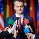a politician giving a public statement to the press