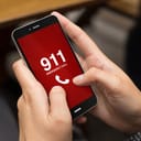 a person dialing 911