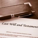 Last Will and Testament document with a pen on top