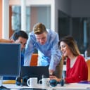 Startup business group working collaboratively in a modern co-working office space