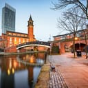 The canal area in Manchester, a picturesque waterway running through the heart of the city.