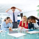 Disappointed young people at a business meeting