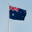The flag of Australia flapping in the wind on a pole