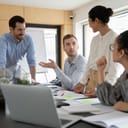Diverse team having a meeting discussing an important topic.
