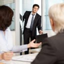 Office worker coming late to meeting
