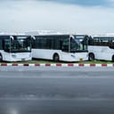 buses lined up at a bus station