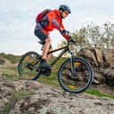 Man riding a mountain bike outdoors