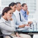 Bored office worker attending a meeting