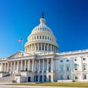 The US Capitol building with clear blue sky in the background