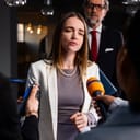 close-up of a female EU consul during a press event in the European Parliament building