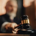 close-upp of a judge's hammer during a trial in a court