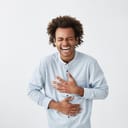 A young man laughing
