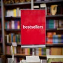 Sign reading 'bestsellers' at a bookshop