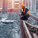 Engineer sitting on railway inspection. construction worker on railways. Engineer work on Railway. Rail, engineer, Infrastructure