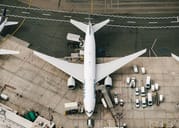 Overhead view of an airplane parked on the runway