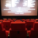 empty theater with ending credits displayed