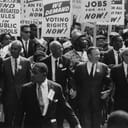 Leaders of the Civil Rights March on Washington, D.C., walking from the Washington Monument to the Lincoln Memorial and holding signs with their demands
