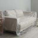 modern furniture covered with plastic film