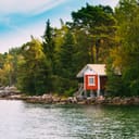 Small cabin on the shore of a lake