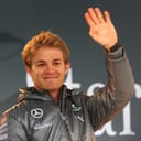 Nico Rosberg waving with a smile on his face