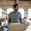If you don't like your job quit. Upset man in casual wear holding box with things and leaving the office. Quit concept. Office life