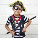 Young boy wearing a pirate costume