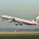 Malaysia Airlines Boeing 777-200ER (9M-MRO) ascending from Charles de Gaulle Airport in France