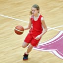 A girl basketball player in a match