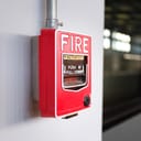 A wall fire alarm