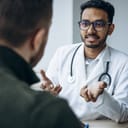 Patient having a visit at doctor making check-up