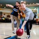 Friends playing bowling