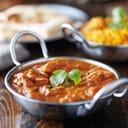 Indian curry dish in a metal plate