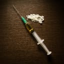 Heroin and a syringe/needle