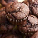 Chocolate muffins with crispy top (selective focus)