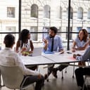 Corporate business team and manager in a meeting, close up