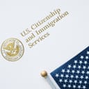 Envelope from U.S. Citizenship and Immigration Services with an American flag