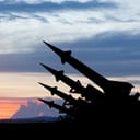 The missiles are aimed to the sky at sunset. Nuclear bomb, chemical weapons, missile defense, a system of salvo fire