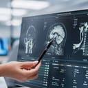 Doctor analyzing an MRI scan of the head.