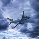 A commercial airplane flying with bad weather in the background