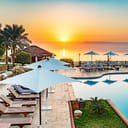 View of an empty luxury resort at sunset
