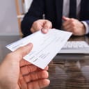 A man receiving a check