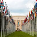 United Nations building with flags of all members
