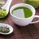 Green tea n the brown mat close-up